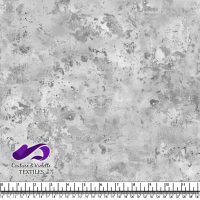 Gray textured fabric background with mottled pattern