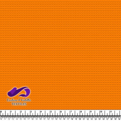 Motif à pois de jouet en briques orange