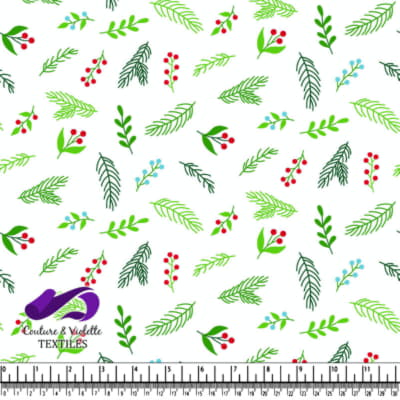 Green leaves and red berries on white background