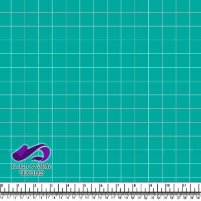 Tissu bleu sarcelle avec des lignes blanches en grille