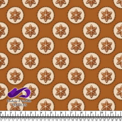 Biscuits en forme d'étoile sur fond brun avec branding textile