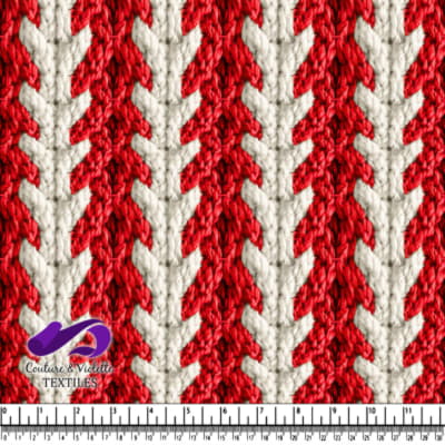 Gros plan sur un tissu tricoté texturé rouge et blanc avec un motif en flèches