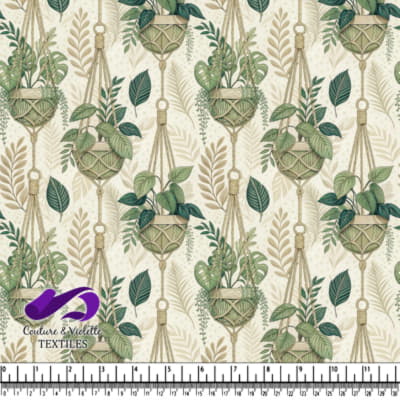 Green leafy plants in hanging macrame pots with tropical leaf