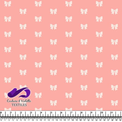 Pink fabric pattern with white bows